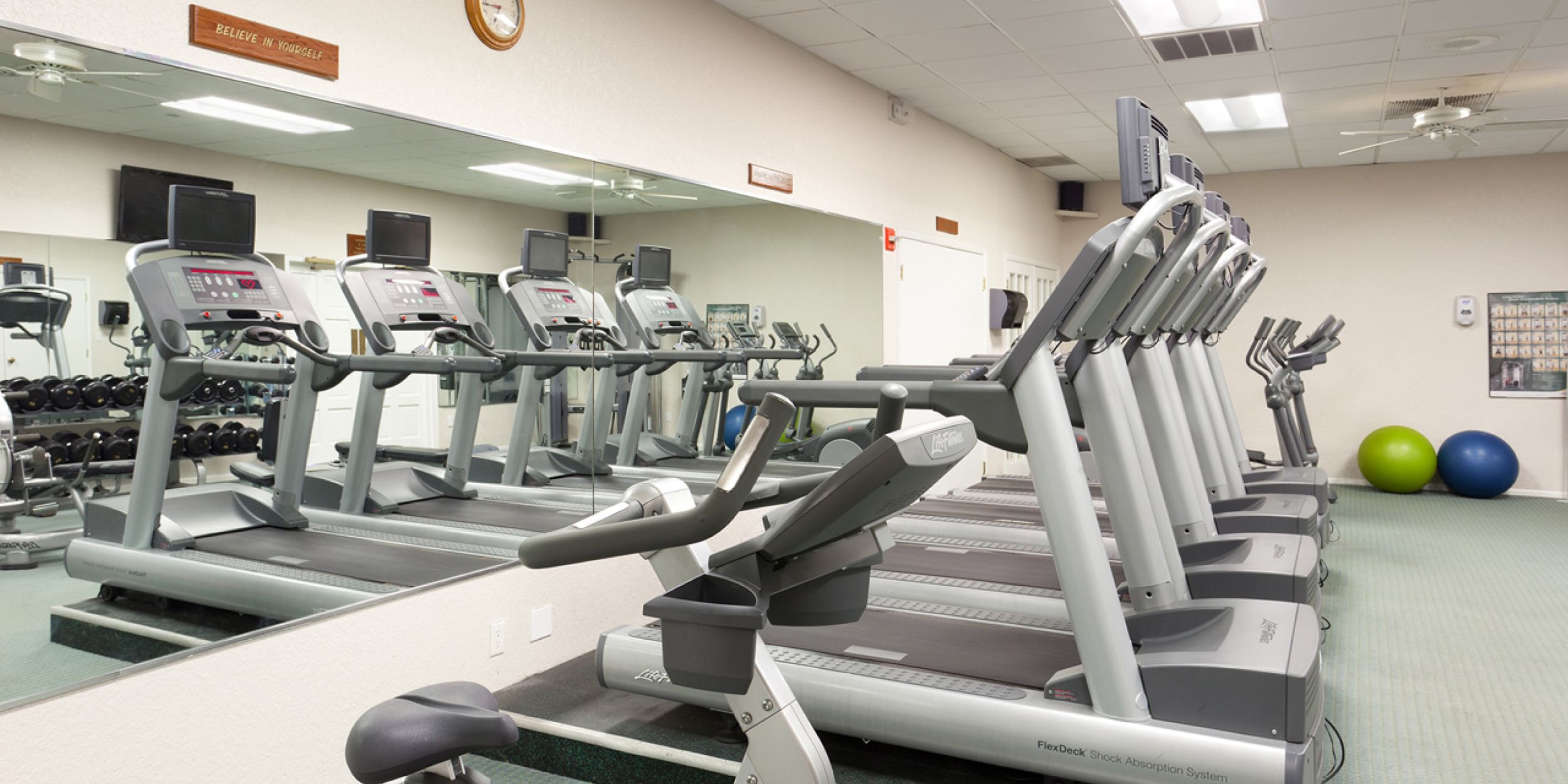 Exercise balls, gym weights and treadmills in the Island Grand Beach Resort's Spa & Fitness Center