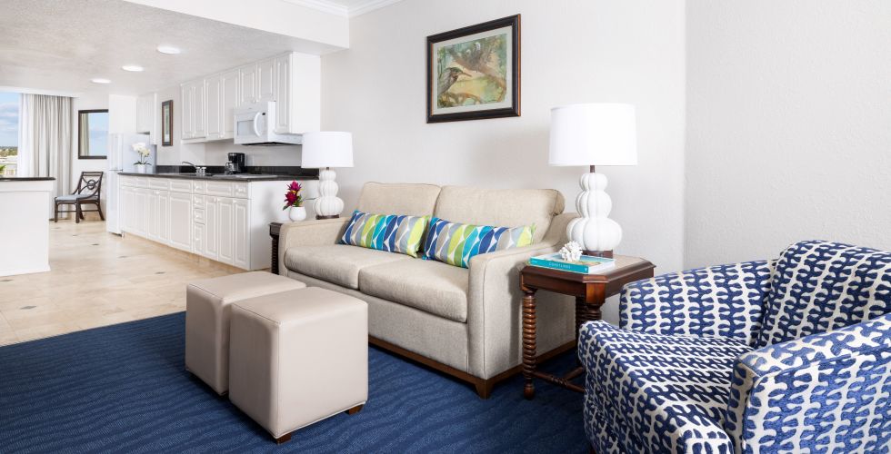 A Living Room With A Blue Carpet
