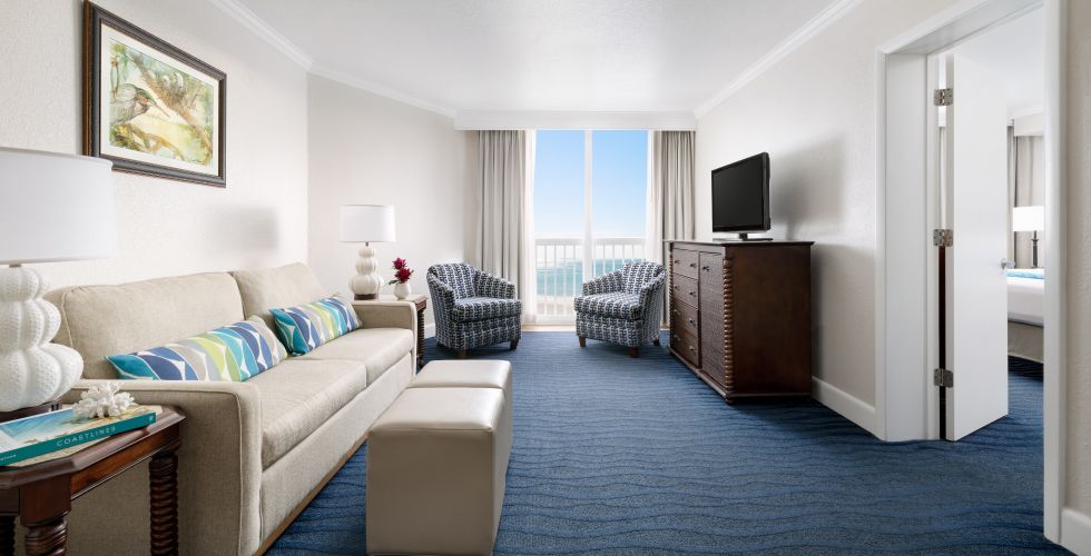 A Living Room With A Blue Carpet
